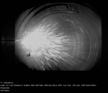 Image of debris from a plasma-facing component shooting into the plasma due to interaction with runaway electrons during a disruption in the Tore Supra tokamak.  (A. Loarte, ITER)