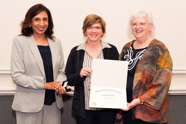 Presentation of the certificate by President Peggy Nelson and Vice President Subha Maruvada of the Society (large view)